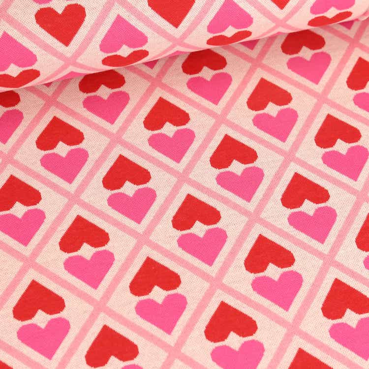 Organic Cotton Jaquard Fabric with Geometric Red & Pink Heart Design on Ivory