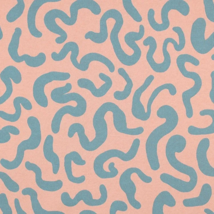 Brushed Cotton Jogging Fabric with Teal Squiggles On Peach 