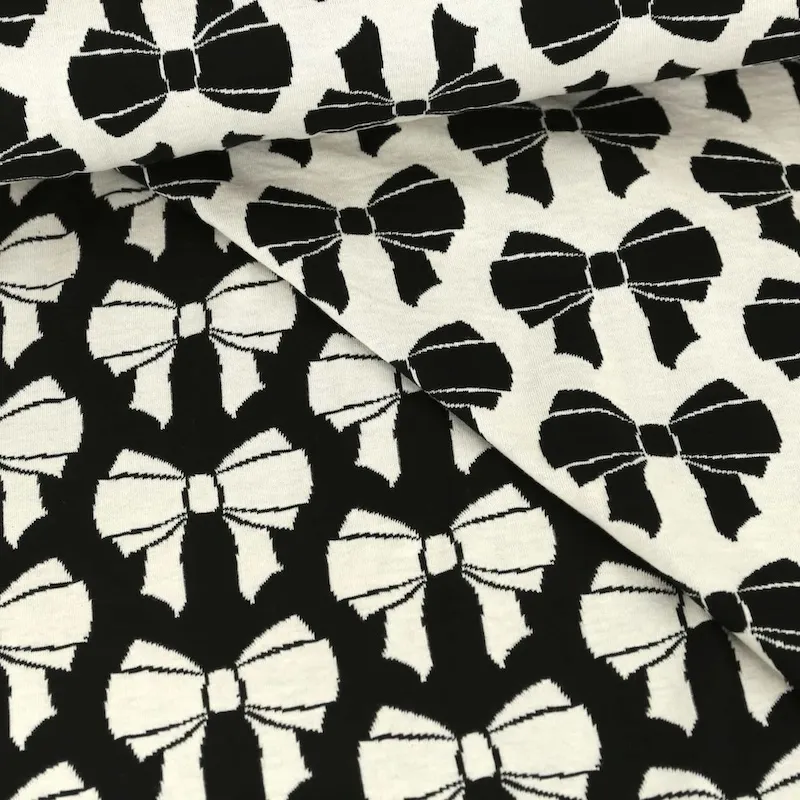 Organic Cotton Reversible Jaquard Fabric with Bows in Black and White
