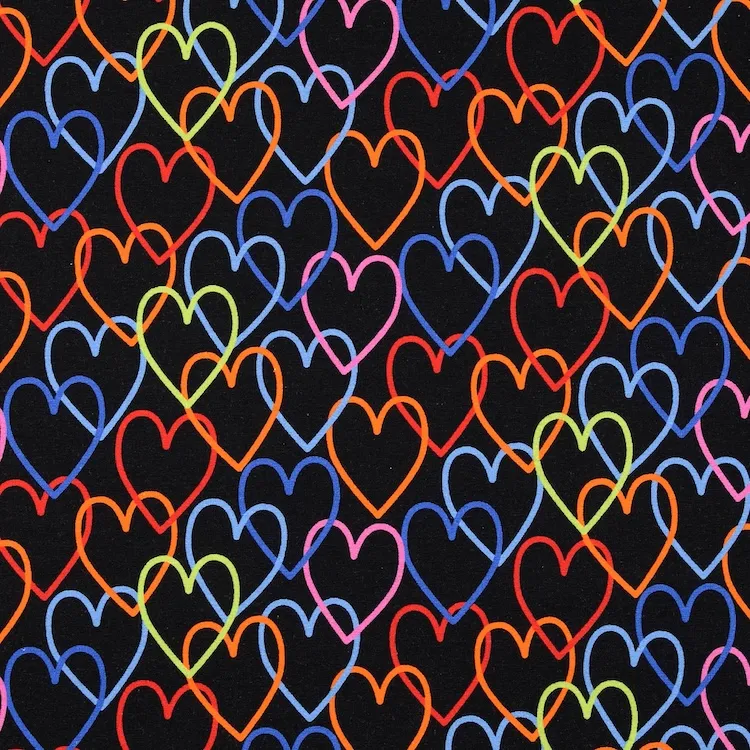 Cotton Jersey Fabric with Colourful Hearts on Black