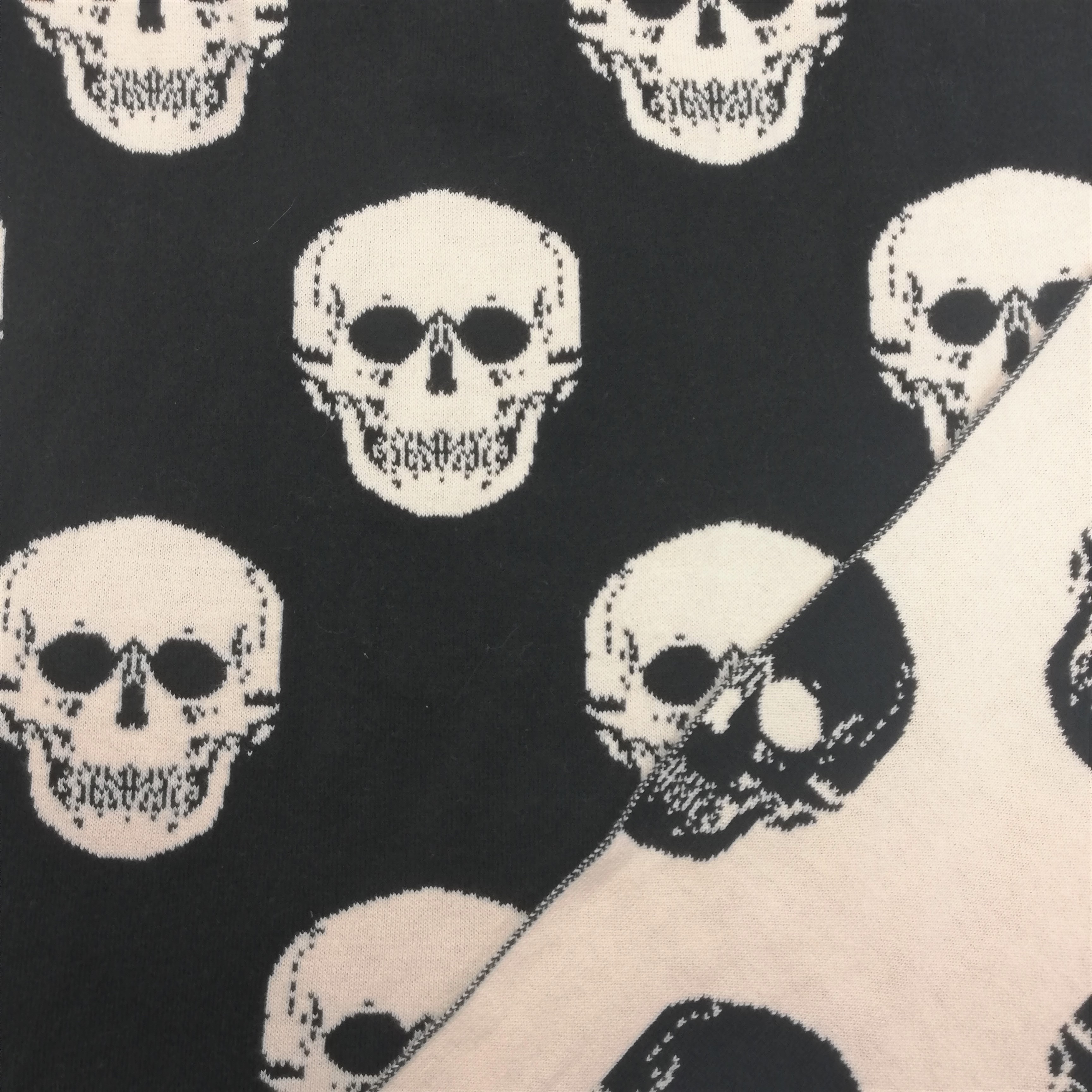 Knit Sweater Fabric with Doubleface Skull Design in Black and Ivory