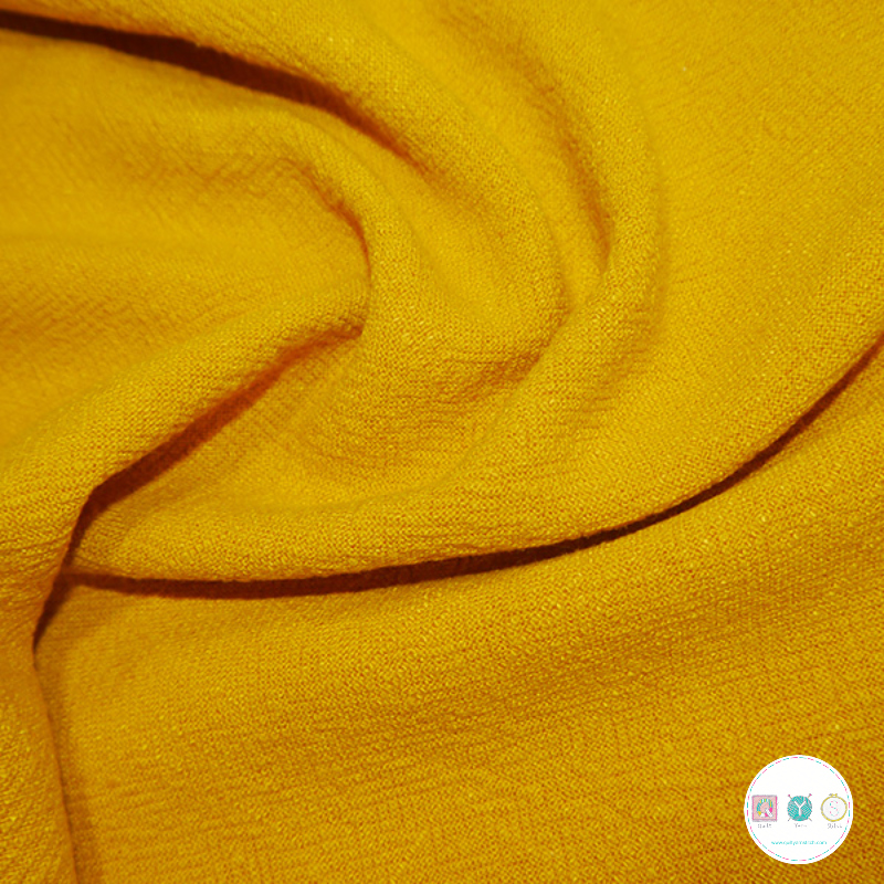 Stonewashed Textured linen Fabric in Ochre Yellow
